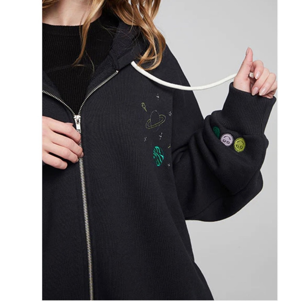 Black oversized zip up sweatshirt with space and smiley face embroidery detail